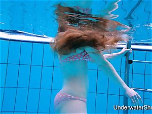 spectacular doll displays handsome body underwater