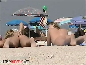 light-haired model nudist on the bare beach voyeur vid