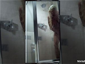 Home movie of Nikita Von James taking a shower